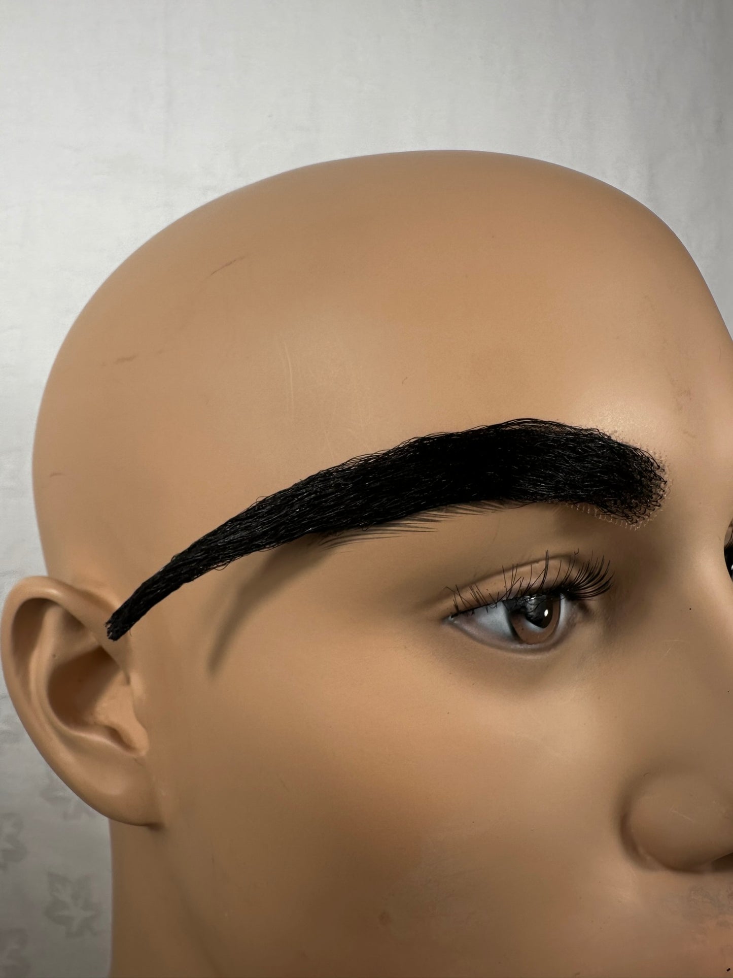 Close up image of prosthetic eyebrows