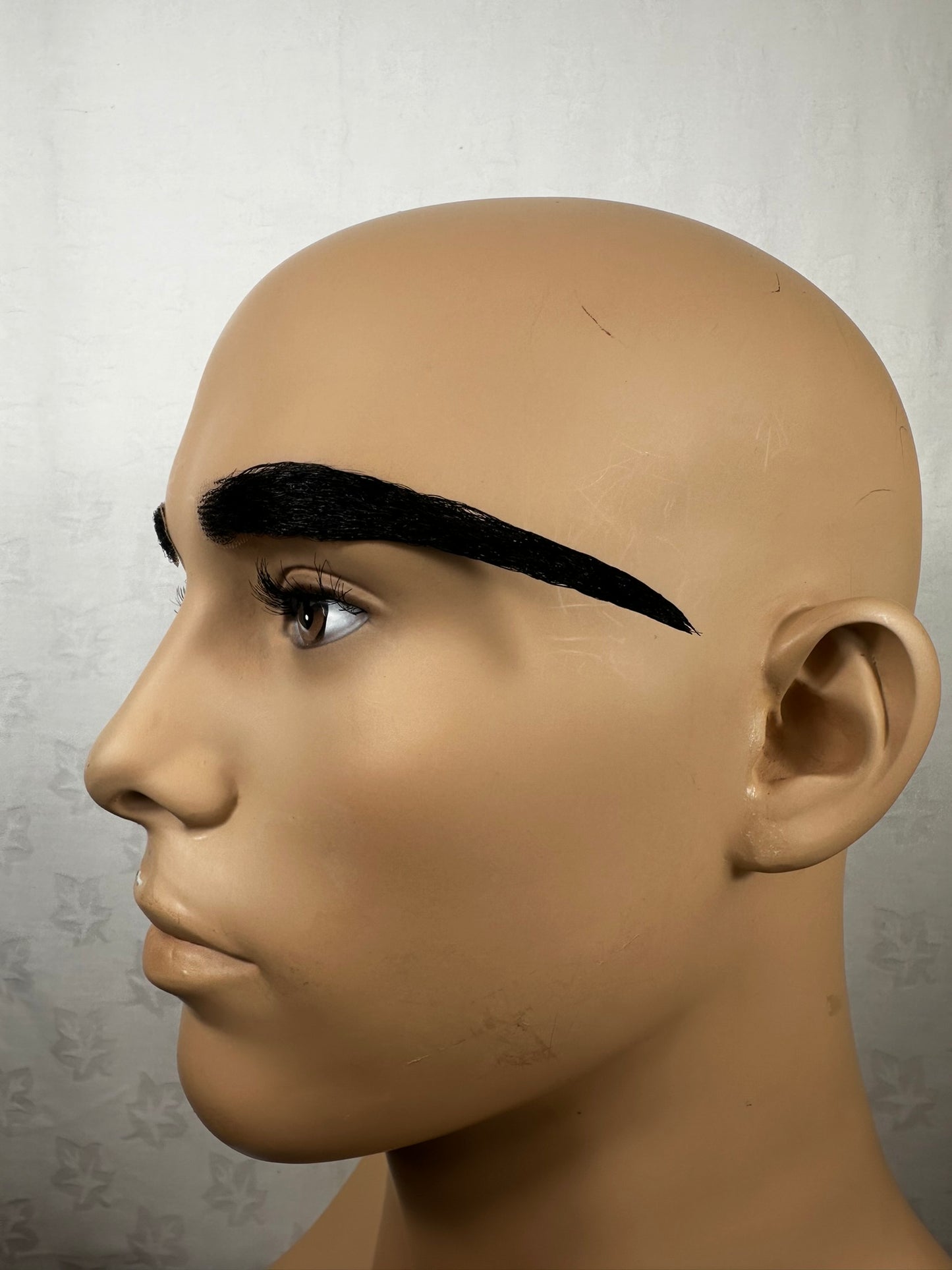 An image of a set of prosthetic eyebrows